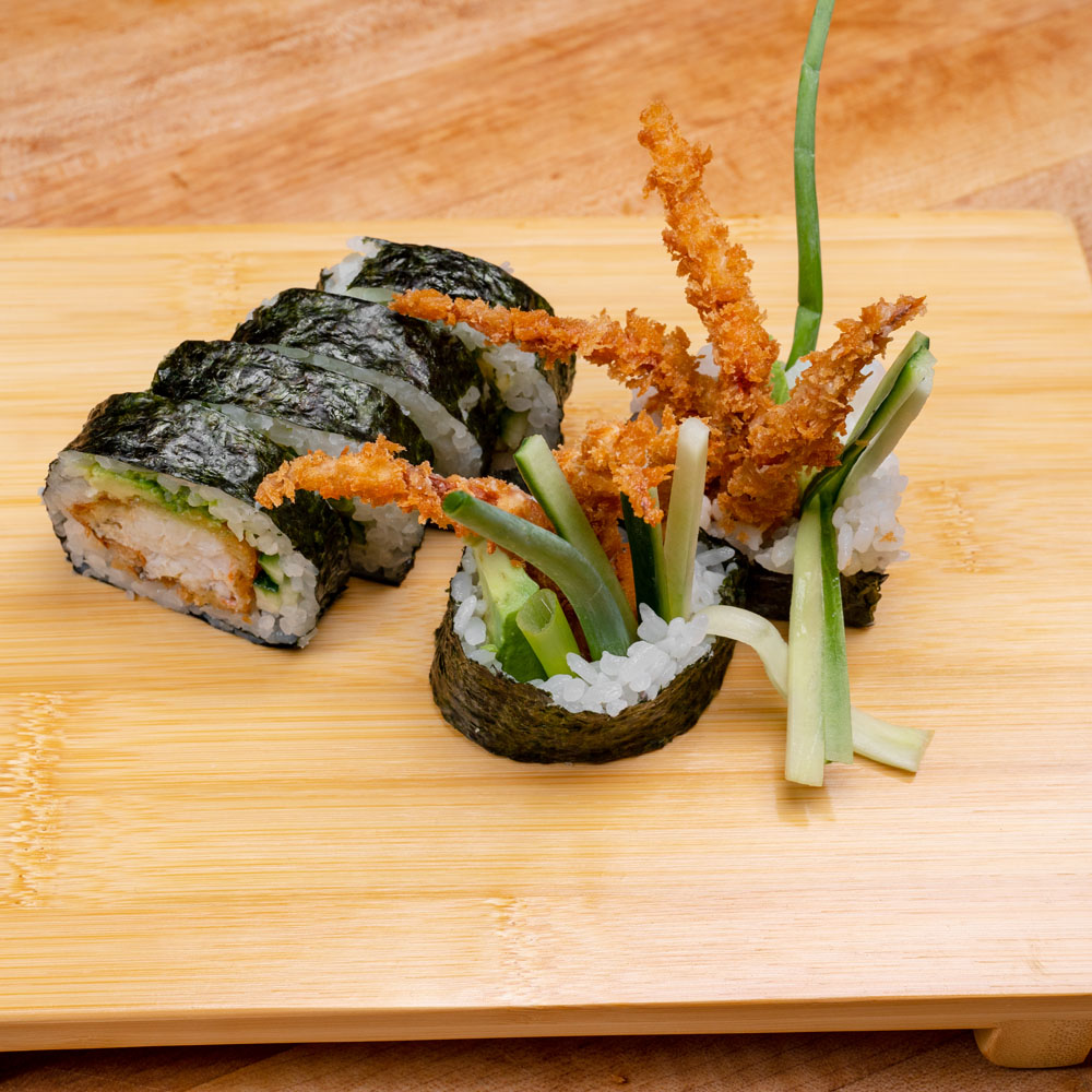 Spider Roll — sushi roll with deep-fried soft shell crab, avocado, and cucumber.